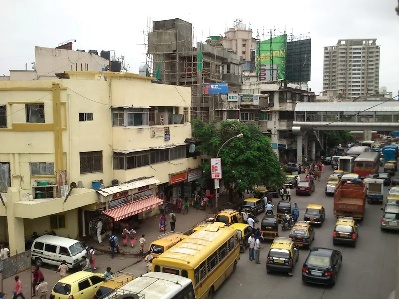 Sion Koliwada red light area, Mumbai — old buildings and busy street life around Sion Circle, near the station