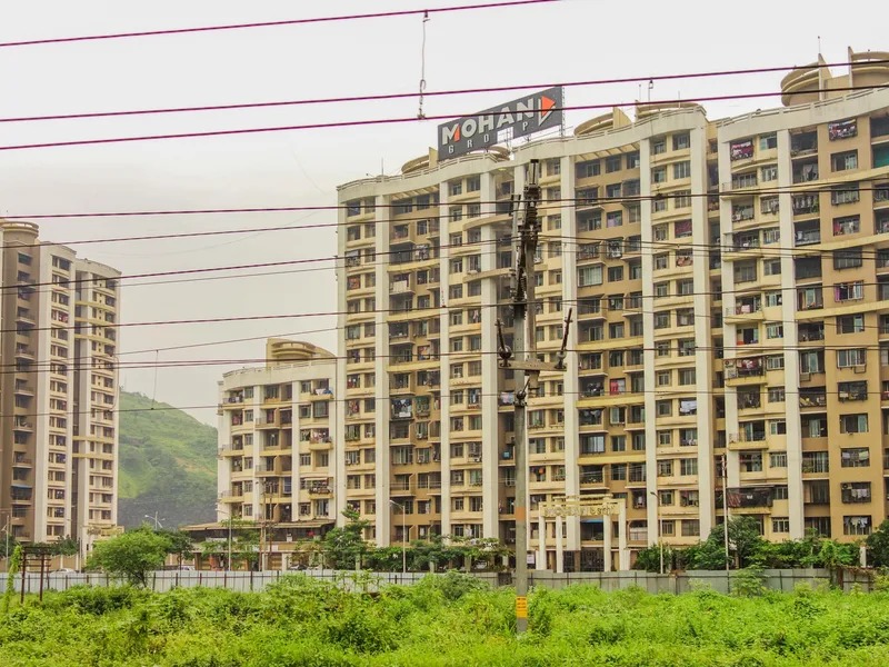 Ulhasnagar red light area, Mumbai — dense apartment blocks packed behind the rail lines in Ulhasnagar